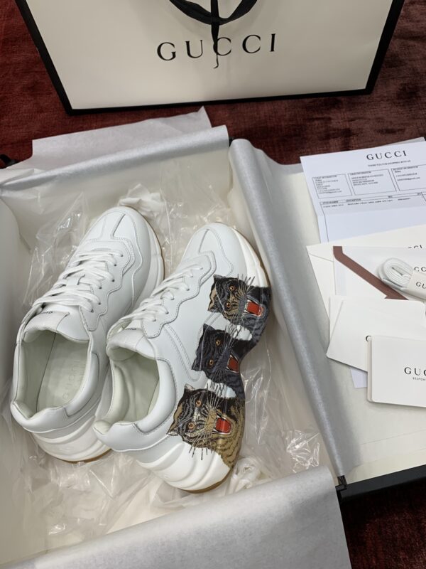 13424944772567375 Gucci Rhyton