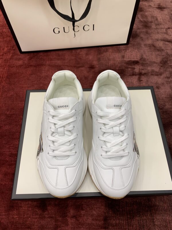13424944780127102 Gucci Rhyton
